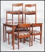A 1960's retro 20th century Macintosh of Kirkcaldy teak dining suite comprising extending dining