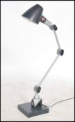 An original industrial factory anglepoise lamp by EDL. A multi adjustable arm with switch to base