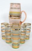 A mid century retro / vintage glass lemondade set to include 6 hi-ball glasses and the matching jug,