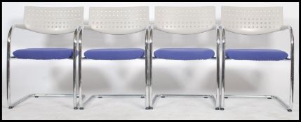 A set of 4 genuine Antonio Citterio for Vitra ' Visavis ' blue and white resin cast pierced back