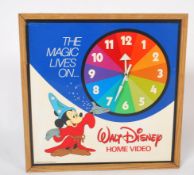 A vintage 1980's shop advertising point of sale clock advertising for Walt Disney home video, with