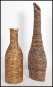 A collection of fabulous large 20th century interior floor standing whicker basket amphora's of