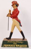 An original vintage retro shop counter point of sale advertising display statue for Johnnie Walker