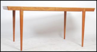 A 20th Century Danish extending table in beech rai