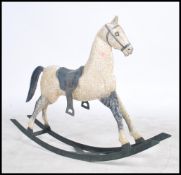 A stunning 20th century tin plate horse constructed from sheet metal and modelled on a Palmero /