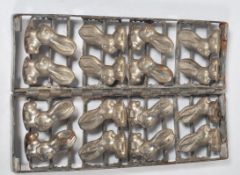 A good 20th century French cast metal chef's / pattissier chocolate mould of double folding form