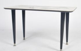 A retro 1950's occasional coffee table in the manner of Terence Conran for Habitat. The formica