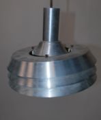 A retro 20th century space age panton style rise and fall lamp having a yellow, aluminium  and