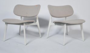 A pair of PLC PearsonLloyd lounge chairs in white and pale lilac / grey, the angular shaped legs