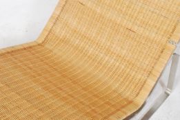 After Poul Kjærholm. A  chaise longue lounger model no  PK24 designed by Poul Kjaerholm originally