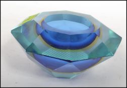 A good mid century Italian studio art glass Murano two tone blue glass ashtray of angular form.