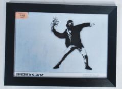 A graffiti urban art stencil print after Bristol Street artist Banksy entitled Flower Bomber 1999