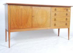 An original mid century Gordon Russell helix inspired walnut sideboard / dresser. Raised on