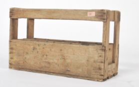 A good mid century Industrial pine wine bottle crate holding 10 bottles with notation for six