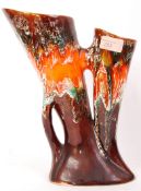A 1970's retro West German Fat Lava inspired twin stem vase of trumpet form having a drip glaze form
