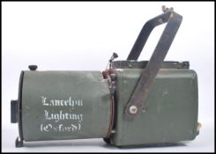 A good mid century Strand Electric Theatre Spot light in unusual green colourway with bracket atop