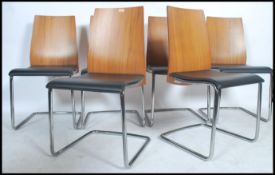A set of 6 contemporary Calligaris 20th century Italian cantilever dining chairs having chrome