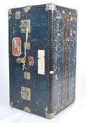 A good early 20th century fitted travel chest - wardrobe in blue with original shipping labels for