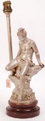 An early 20th century table lamp by Art Union of London, modelled as a cast mythological figure with