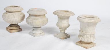 A good collection of 4 believed early 20th century white marble garden urn urn's, each of varying