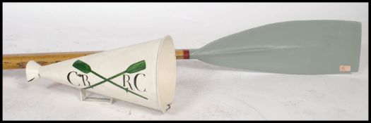 An original full size wooden rowing oar by Ayling together with a fabulous early 20th century Loud