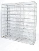 A 20th century large galvanized metal cage Industrial shoe rack / filing storage cubby cabinet. Of