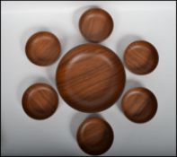 A superb set of mid century ' ROBEX ' plastic bowls having a faux rosewood pattern, a set of 6 small