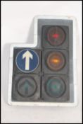 A large set of L-Shaped Industrial traffic lights complete with the blinker hoods and raised on tall