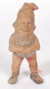A  good19th century continental ( most likely German ) terracotta Gnome still showing remnants of