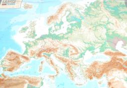 A large mid century school rubber map of Europe being embossed with raised mountain ranges -