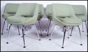 A set of 6 1970's chairs in the manner of Eero Saarinen ' executive chairs ' Each with tub frames
