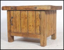 A fantastic vintage rustic butchers block on fitted base cabinet, solid wood block top with metal