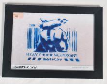 A graffiti urban art stencil print after Bristol Street artist Banksy entitled Heavy Weaponary 1999