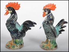 A pair of hand painted 20th century Majolica cocke