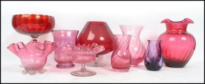 A collection of early 20th century cranberry glass