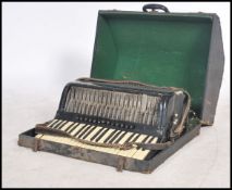 Musical Instruments. A cased vintage early 20th ce