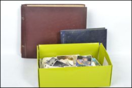 A collection of vintage 20th century postcards and