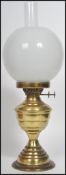 A vintage 20th century duplex brass oil lamp by S.