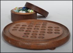 A vintage early 20th century treen travel solitair