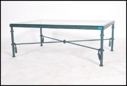 A 20th century heavy cast base coffee table of rec