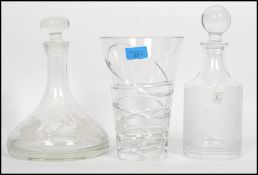 A large cut glass Royal Doulton vase of tapering f