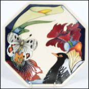 A Moorcroft Designers Medley octagonal plate, tube