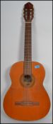 A vintage Dulcet classic six string acoustic guita