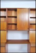 A stunning 1960's teak wood modular wall system in
