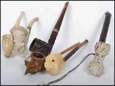 A collection of vintage pipes to include Meerschau