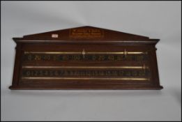A late Victorian oak billiard score board comprisi