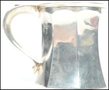 A 20th century silver hallmarked Christening cup / tankard having an octagonal base and sides with