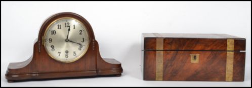 A 19th century brass bound mahogany writing slope together with a silver dial napoleons hat mantel