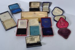 A collection of antique vintage jewellery boxes to include Kemp Bros, Sen Brothers, Regent Street,