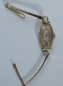 A 1930's Art Deco 14ct white gold ladies cocktail / dress watch having lozenge shaped case with